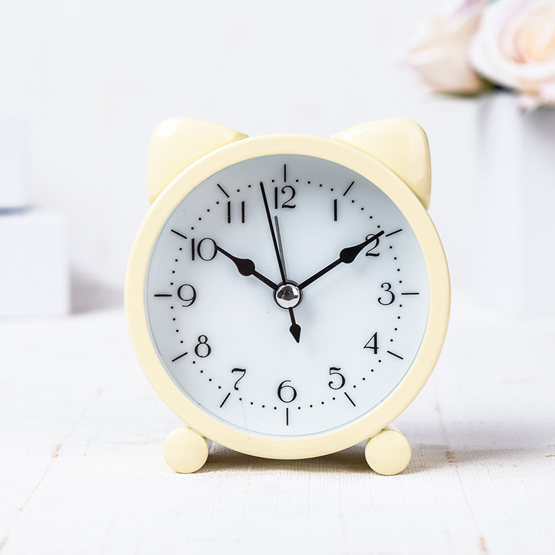 Fábrica directa niños creativos estudiante de metal redondo en forma de gato reloj despertador dormitorio mesita de noche reloj despertador mudo al por mayor