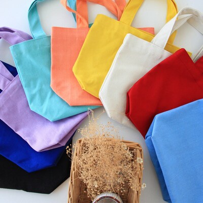 Best Sellers Solid canvas Easy student Lunch box bag Makeup Hand Storage Portable small square package Solid Lunch Bags
