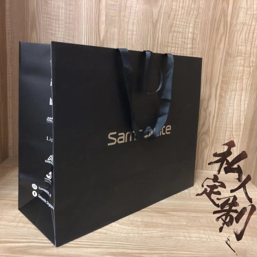 定制外贸白卡纸手提袋创意折叠环保购物服装礼品牛皮纸袋定做