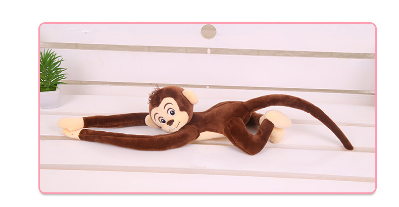 Orange monkey plush toy