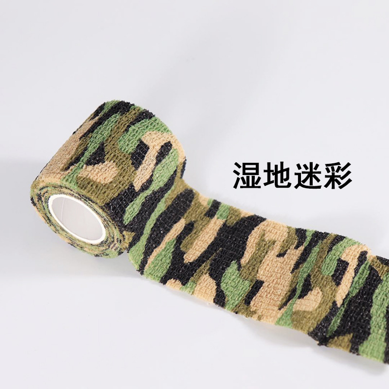 Fábrica sin pegamento cinta de camuflaje telescópica autoadhesiva tela no tejida caza al aire libre caza camuflaje cinta de montar