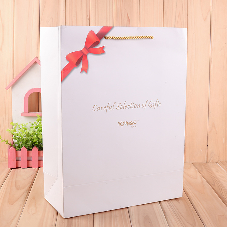 厂家批发手提礼品袋 通用礼物包装白卡纸袋 可定做logo礼品袋定做