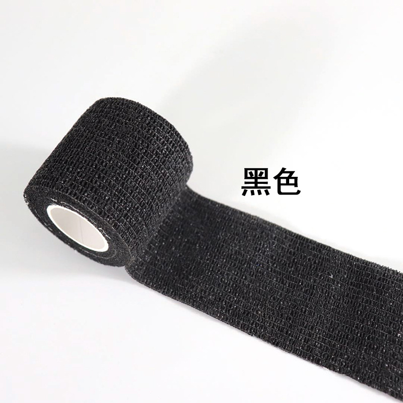 Fábrica sin pegamento cinta de camuflaje telescópica autoadhesiva tela no tejida caza al aire libre caza camuflaje cinta de montar