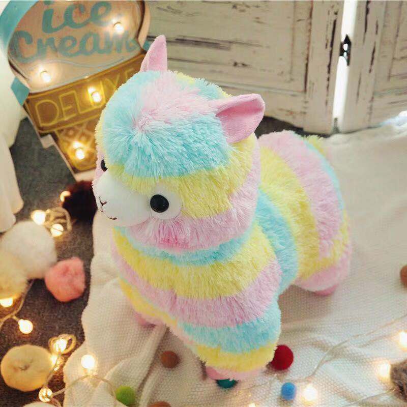 Venta al por mayor animal lindo Arco Iris alpaca muñeca de peluche juguete colorido hierba barro caballo agarrar máquina trapo muñeca