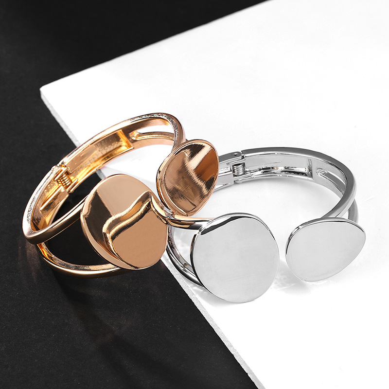 Hollow Asymmetrical Oval Alloy Open Bracelet