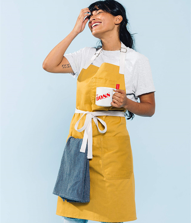 廠家批發(fā)廚房圍裙耐污可調節(jié)頸帶圍裙 帶掛環(huán)黃色圍裙