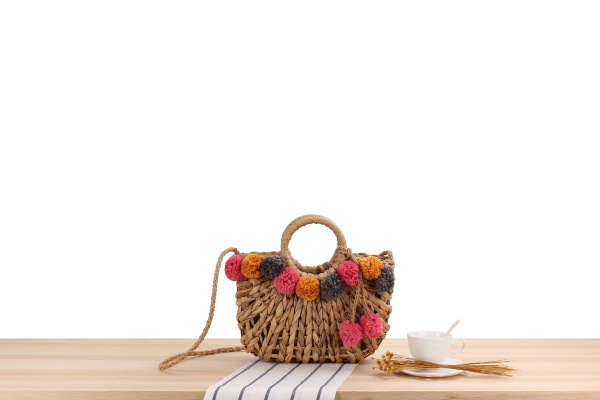 New Cute Color Hair Ball Hollow Hand-carried Straw Woven Bag 32*28*7cm display picture 1