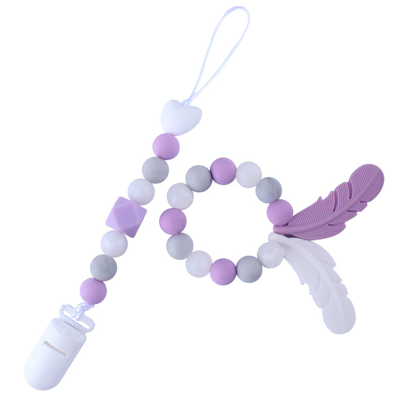 Productos para bebés de silicona chupete cadena mordedor pluma de dibujos animados de silicona juguete dientes molienda teether traje