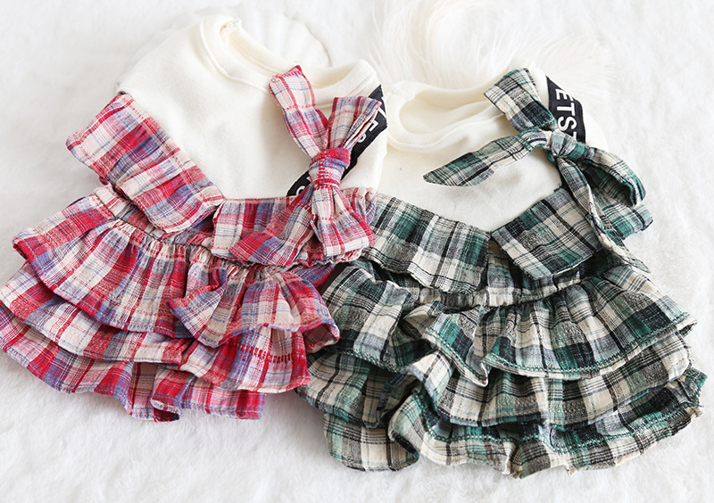 彩格口袋拼接裙