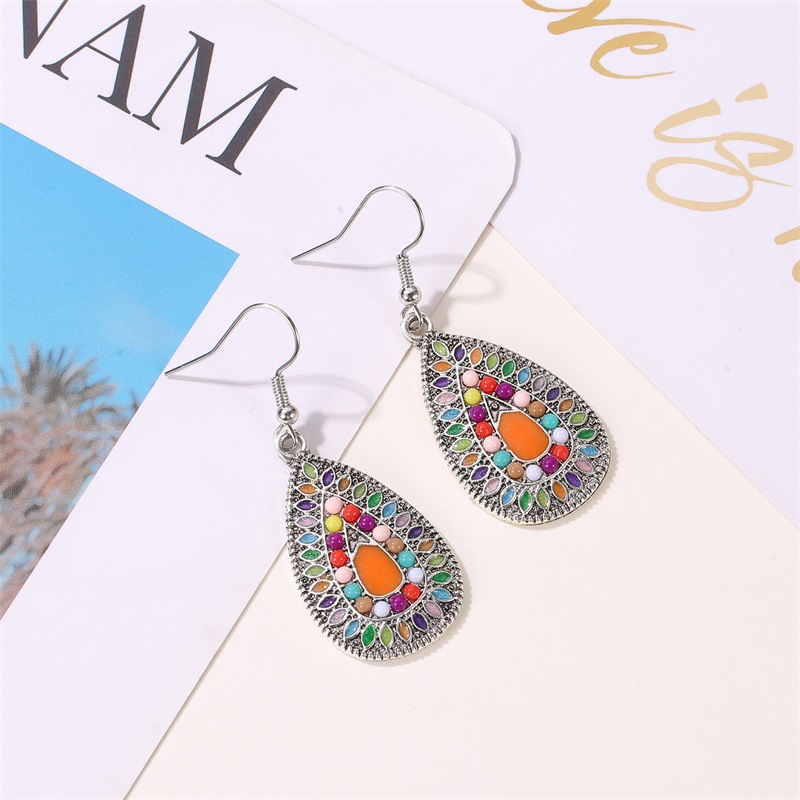 New Retro Colorful Water Drop Ethnic Style Color Sun Flower Drop Oil Earrings Wholesale display picture 3