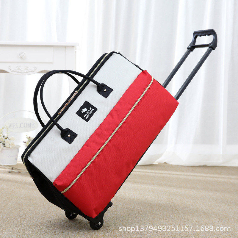 Nuevo bolso de la carretilla maleta bolsa de embarque impermeable para hombres y mujeres bolsa de viaje portátil color a juego bolsa de carro de rueda unidireccional