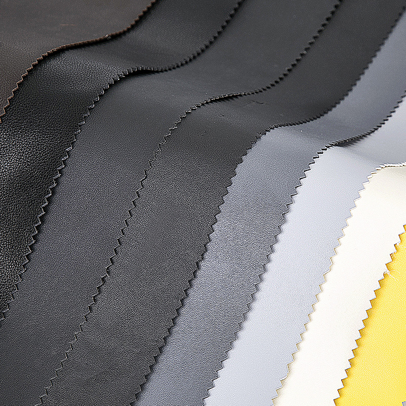 厂家优惠直销pvc纯胶汽车革免洗面料荔枝纹皮革耐刮耐磨