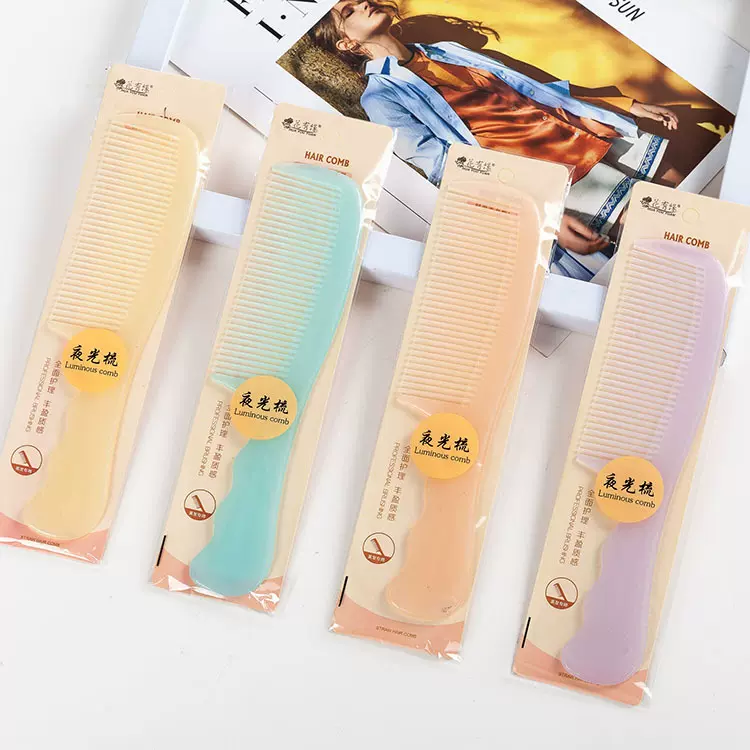 创意按摩顺发塑料牛筋梳子地摊新意小商品梳子夜光梳护发