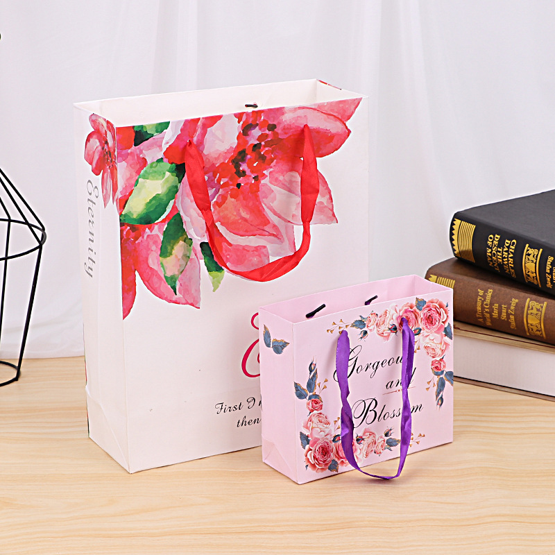 厂家直供 服装手提纸袋定制 化妆品礼品包装白卡纸袋 可印刷logo