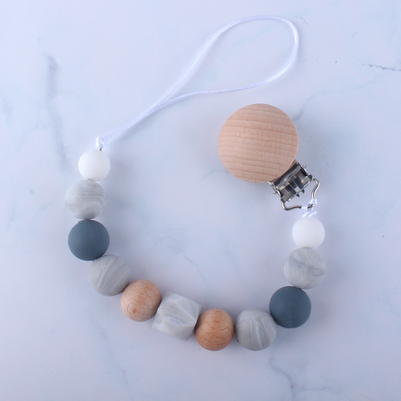 Bebé chupete anti-gota cadena bebé juguete de silicona chupete clip anti-gota banda Chew música anti-perdido cadena Nuevo