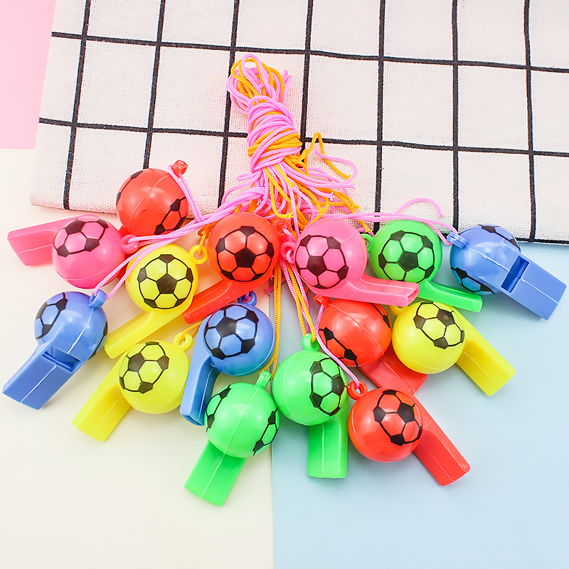 Nueva cara sonriente silbato Copa Mundial de los aficionados al fútbol silbato de plástico colorido para niños silbato puesto de empuje regalos
