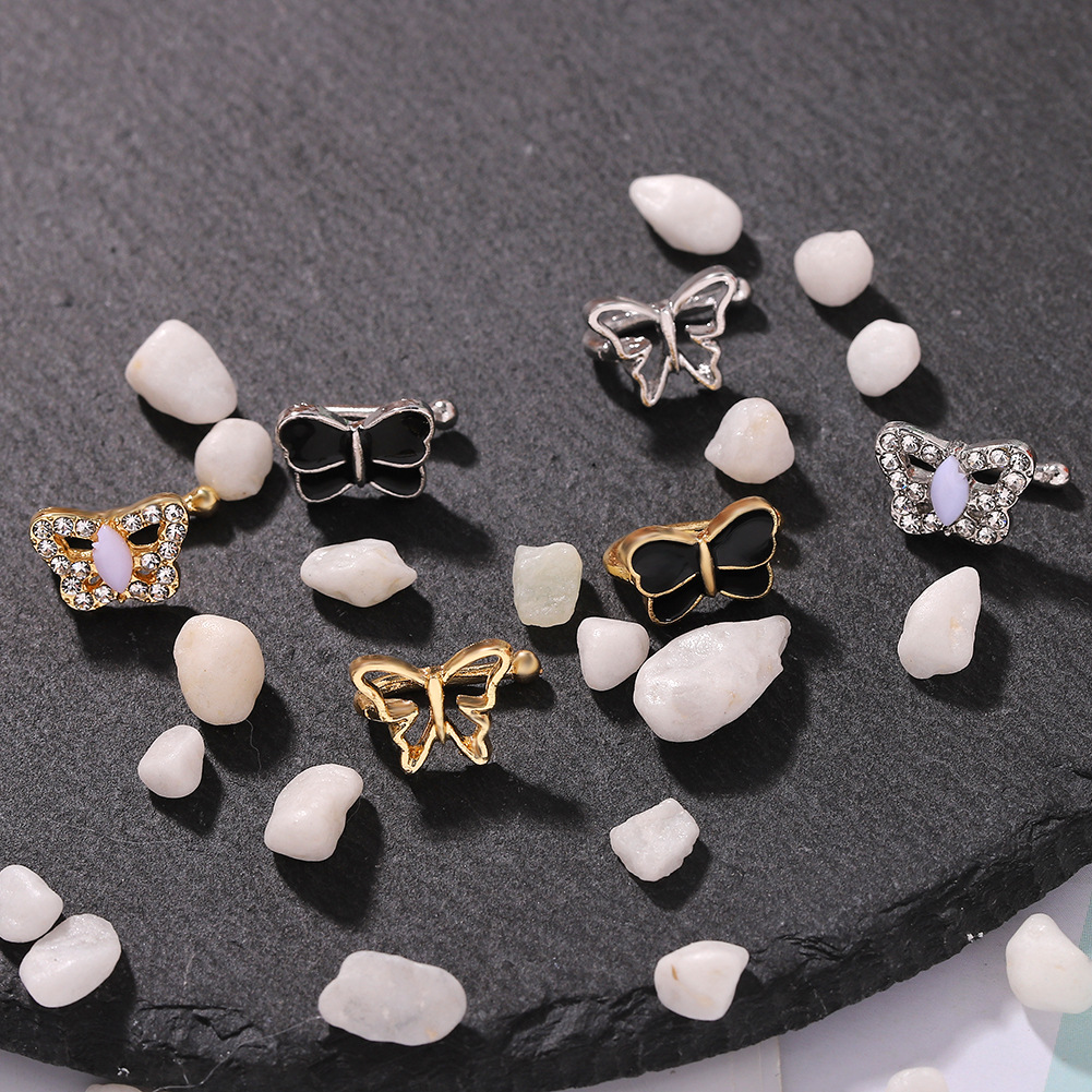 Aleación Studded Butterfly Ear Stud Pendientes Simple Wild Jewelry Set Al Por Mayor display picture 8