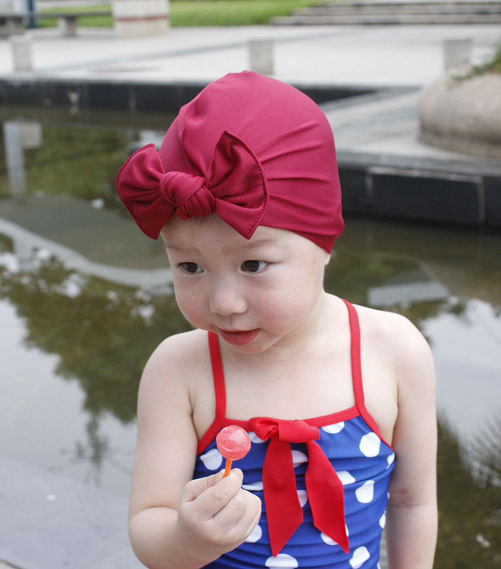 Enfants De Bonnet De Bain Croix-frontière Chaude Polyester Acrylique Bébé Arc Chapeau Bonne Élasticité Solide Couleur Impression Bébé De Natation Cap display picture 15