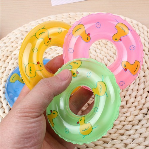 Mini small swimming ring for children playing in the water and bathing toys little yellow duck accessories milk tea shop donut small swimming ring wholesale