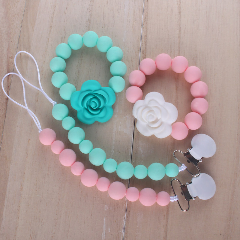 Productos del bebé silicona teether bebé flor dibujos animados silicona juguete teether chupete traje