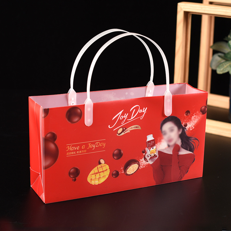 厂家批发pp袋 pp手提化妆品袋 服装塑料包装袋定 制伴手礼袋