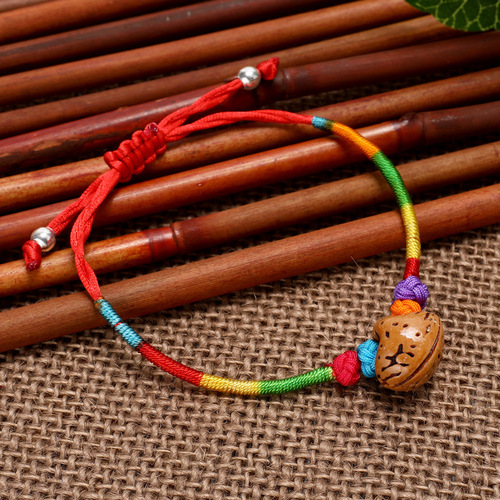 Handmade woven five-colored thread bracelet with five-colored thread and peach kernel red rope for the Dragon Boat Festival, wholesale accessories for the Dragon Boat Festival.