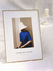 A thin aluminum picture frame with a narrow border, suitable for mounting any size of washed photographs, 3D posters, and photo art.