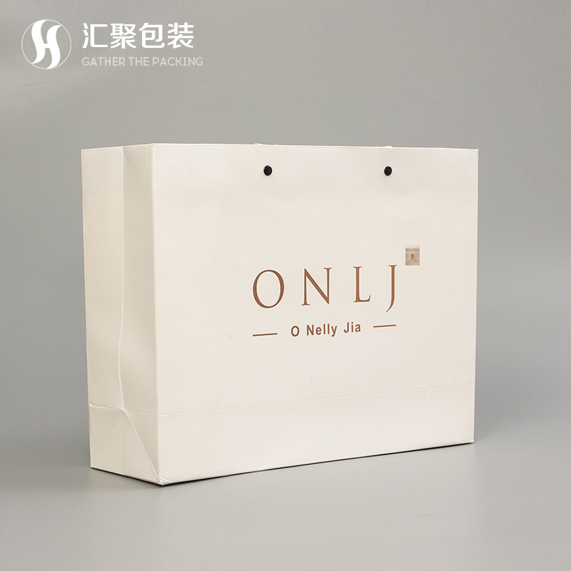 简约时尚服装店袋子logo烫金购物礼品包装纸袋定 制