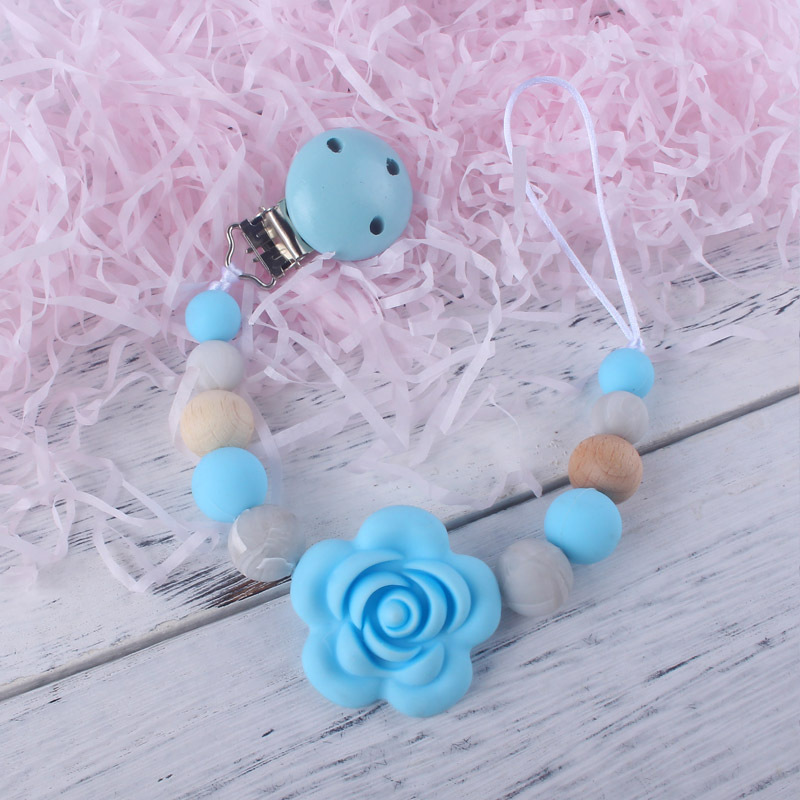 Cadena de chupete de silicona para bebés Amazon Cadena de molienda de dientes de bebés cadena anti-Caída de mordedor calmante personalizada por los fabricantes