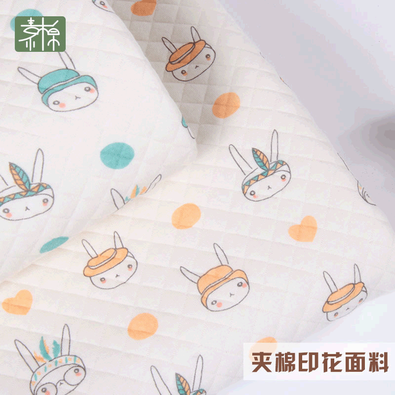 新疆棉卡通A类印花夹棉布 针织空气层面料 秋冬婴儿服装布料现货