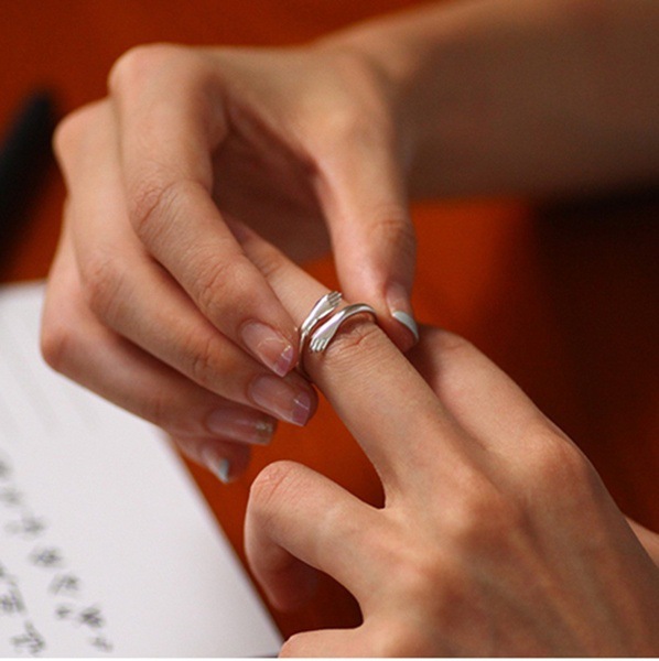 hands crossed embrace couple ring opening personality creativity ring