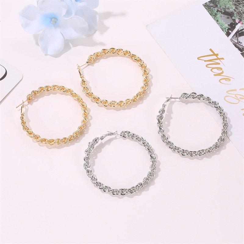 New Creative Woven Design Alloy Earrings Exaggerated Large Circle Twist Earrings Wholesale Nihaojewelry display picture 3