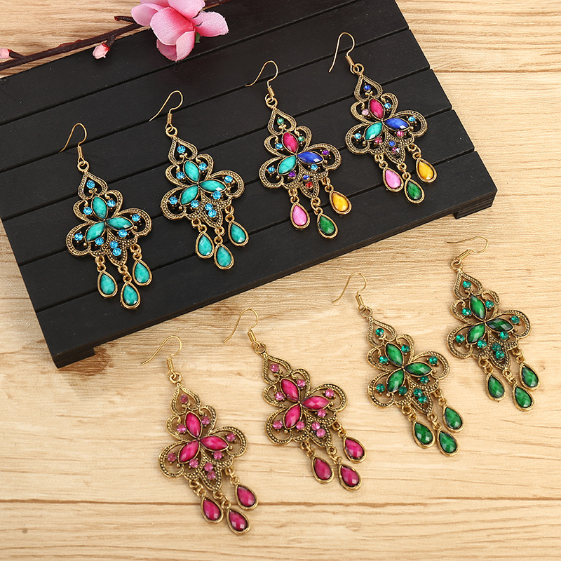 1 Pair Ethnic Style Water Droplets Metal Plating Inlay Artificial Gemstones Women's Drop Earrings display picture 1