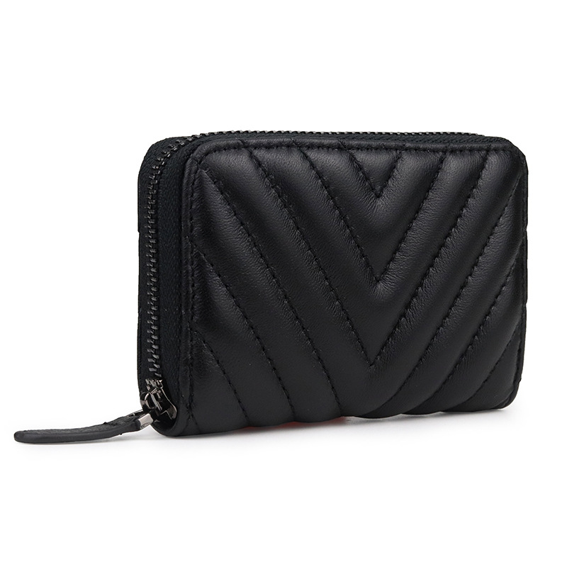 Bolsa de cambio de piel de oveja suave, bolsa de cuero bordada de moda, nueva bolsa de monedas transfronterizas, una bolsa de venta