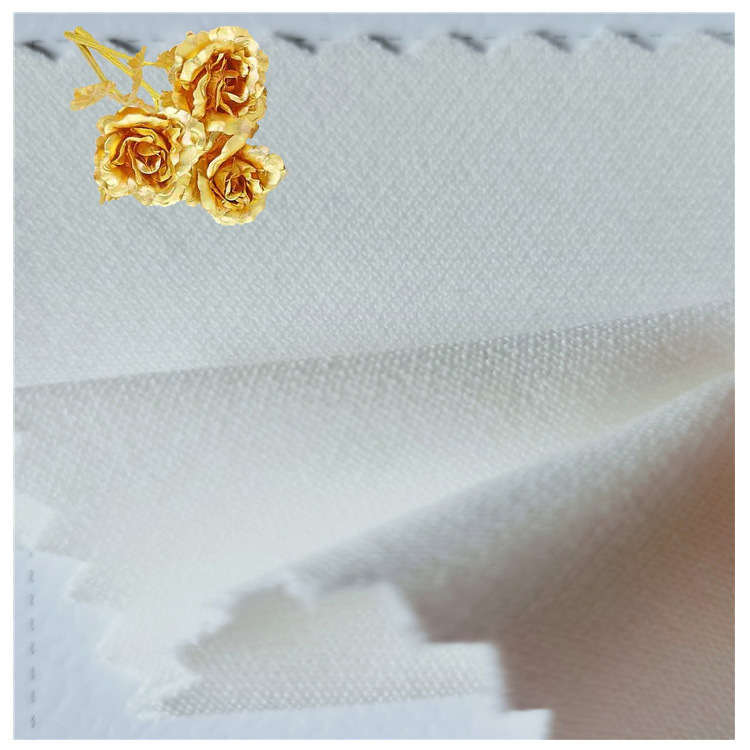 供应秋款时尚四面弹女装小外套裤装休闲服面料全涤四面弹力布现货