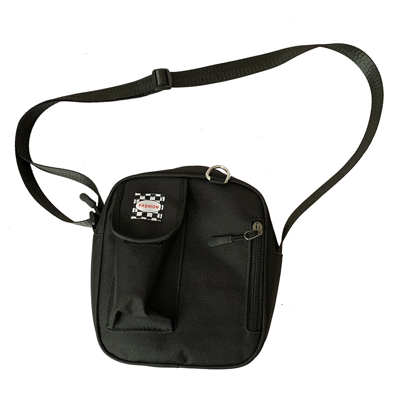 Bolsa pequeña de lona para mujer 2019 Nueva bolsa de mensajero de moda estilo coreano estudiante ins Internet celebridad pequeña bolsa negra entrega de una pieza