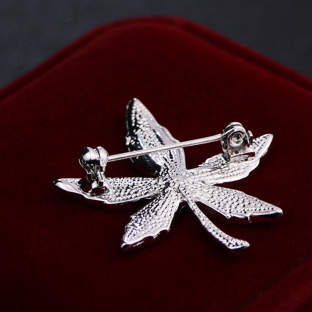 Unisex clothing brooch with safety clasp