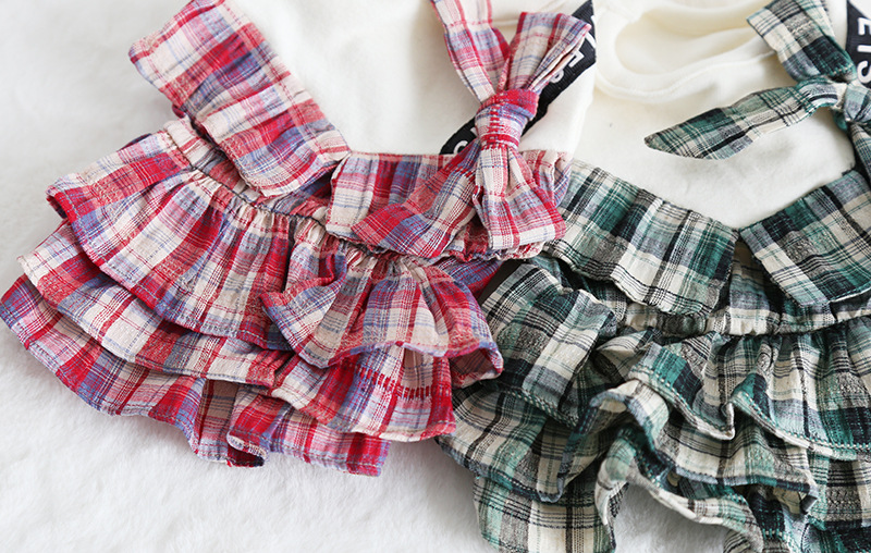 彩格口袋拼接裙