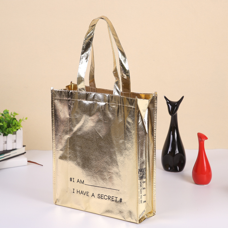 覆膜无纺布手提袋定做 金色针刺无纺布简约服装购物袋定制印logo