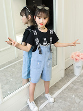 Quần áo bé gái phù hợp với bé trai lớn 2019 hè mới xu hướng thời trang Hàn Quốc ngắn tay đặt chai Coke Bộ đồ trẻ em