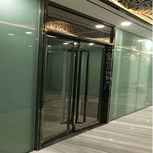 十年定制酒店含門框鈦金不銹鋼門套 非標雙開地彈門帶鋼化玻璃