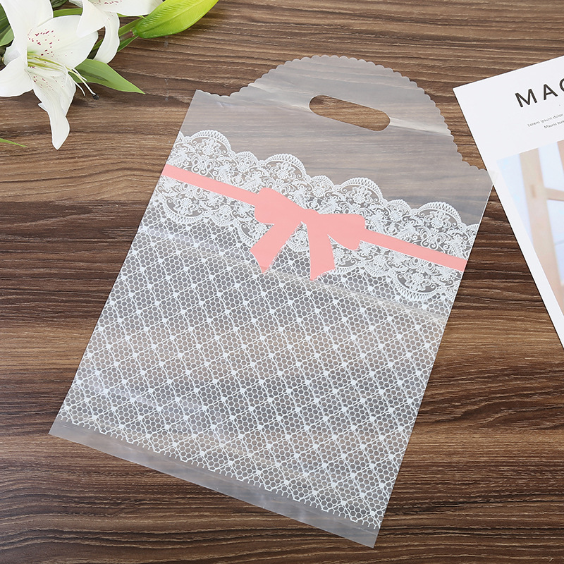 厂家透明pe袋 蕾丝边蝴蝶结塑料袋 饰品礼品手提袋礼品定 制批发
