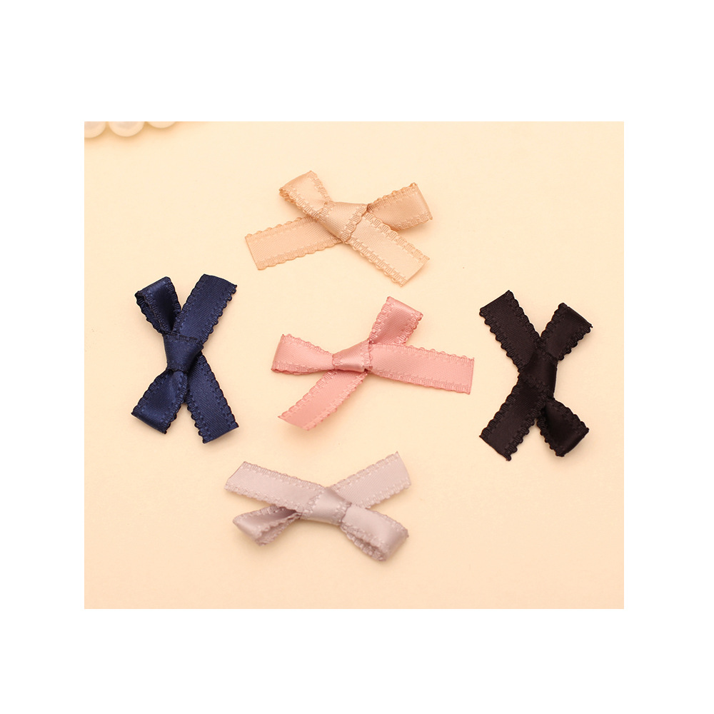 1厘米花边双面涤纶蝴蝶结白底