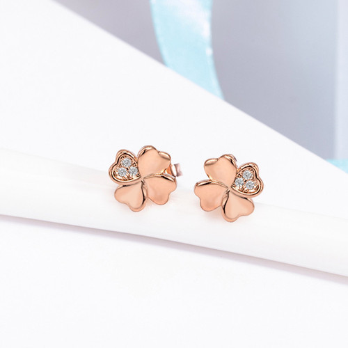 Korean version of rose gold four-leaf clover earrings for female students, celebrity earrings, diamond-set four-leaf clover earrings, simple jewelry