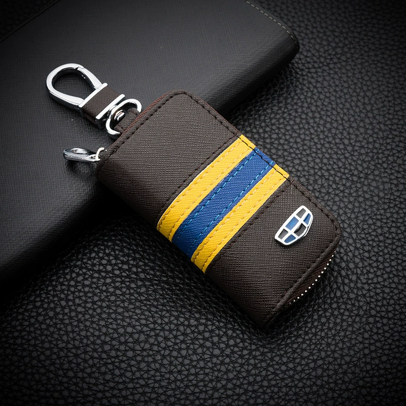 Car keys, modern key bag with zipper, three colors