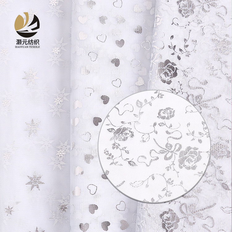 厂家供应 时尚网布烫金印花面料 舞台演出服连衣裙服装面料