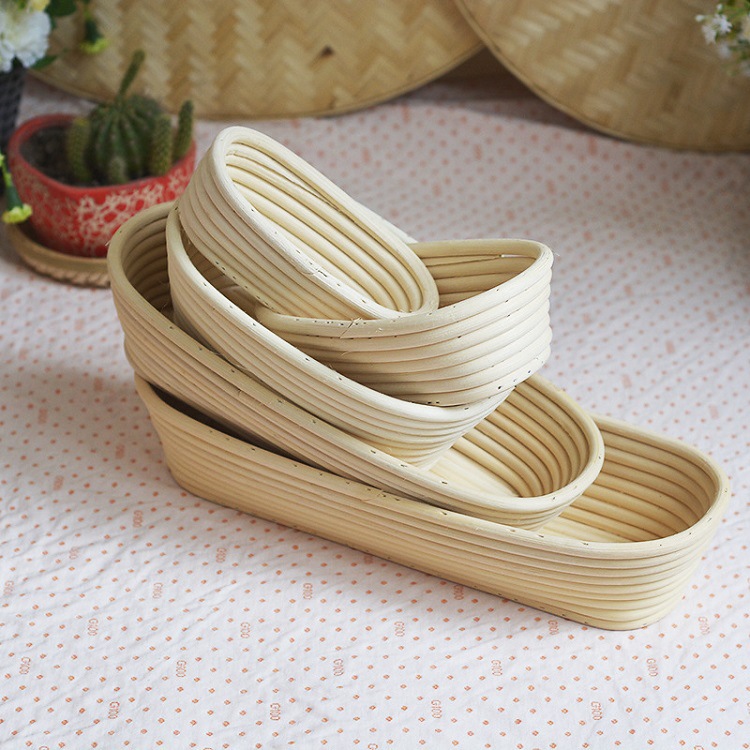 Cesta de fermentación de pan de ratán indonesio natural hecha a mano cesta de bolsa de mimbre redondo tejido europeo cesta de almacenamiento de ratán indonesio ovalada