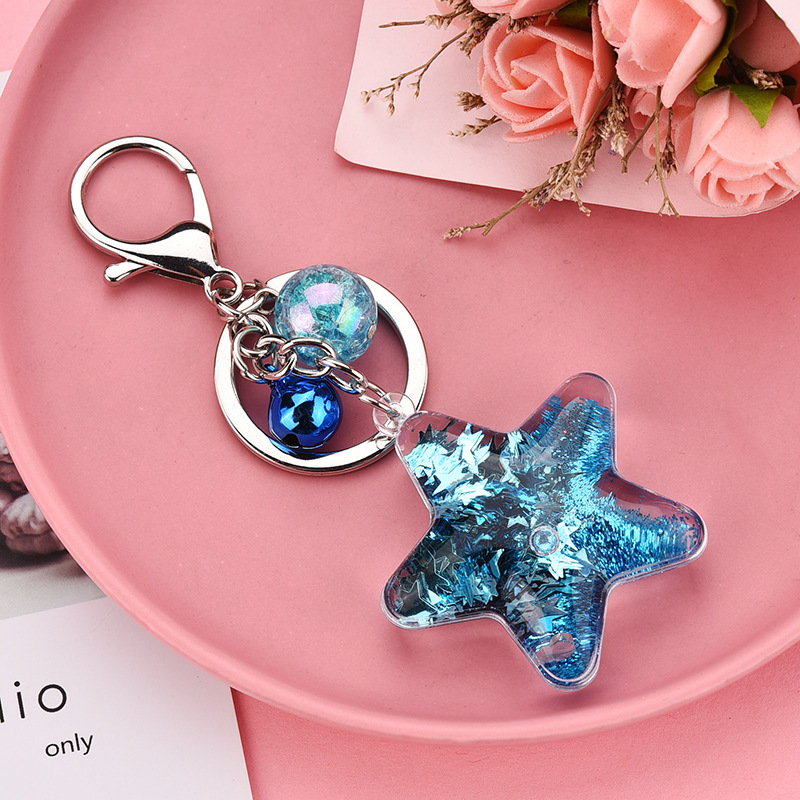 Korean Acrylic Five-pointed Star Flowing Sequins Keychain Wholesale Nihaojewelry display picture 6