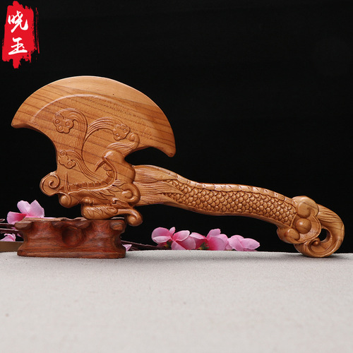 Manufacturer peach wood dragon with ax ax feng shui supplies peach wood carving crafts