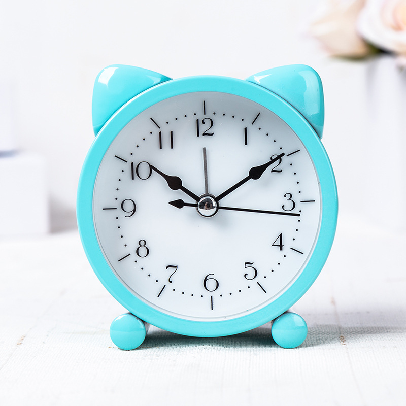 Fábrica directa niños creativos estudiante de metal redondo en forma de gato reloj despertador dormitorio mesita de noche reloj despertador mudo al por mayor